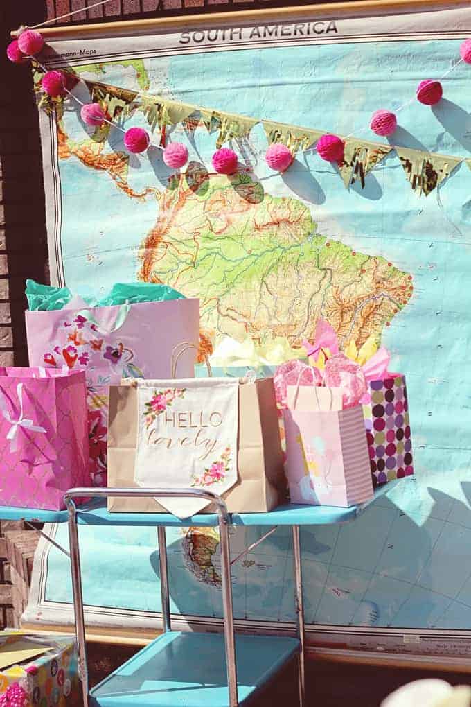 Greatest adventure baby shower with a map as decoration