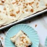 Coconut Carrot Sheet Cake is a moist carrot cake recipe made with coconut oil and cream cheese icing. Cut into squares it's the perfect snacking cake or cake for a crowd. carrot cake | carrot cake recipe with cream cheese frosting