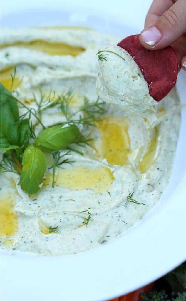 Whipped Feta Herb Dip is a flavorful addition to crudites with feta cheese whipped until light and fluffy with roasted garlic and loads of fresh herbs. easy dip recipe |creamy dip | whipped feta