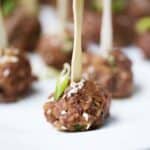 Mini meatball recipe made with soy sauce, sesame seeds and green onions.