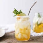 Peach tea cocktail recipe made with mint, sparkling water and bourbon.