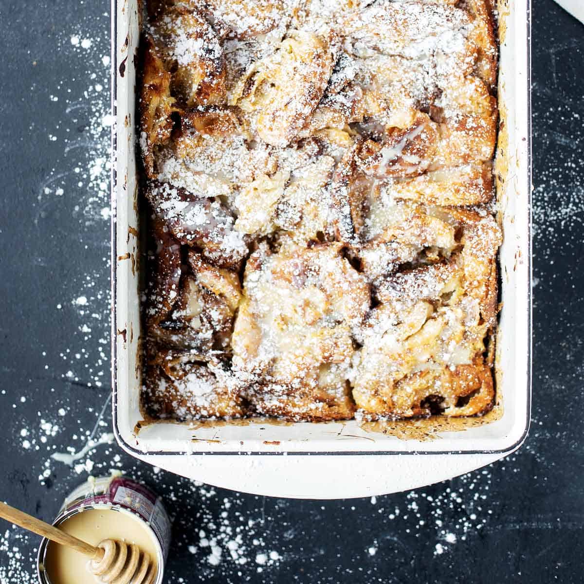 Cinnamon Croissant French Toast Bake is a decadent, delicious, easy, make-ahead breakfast with crispy layered croissants coated in a sweetened condensed milk custard and baked until puffy.