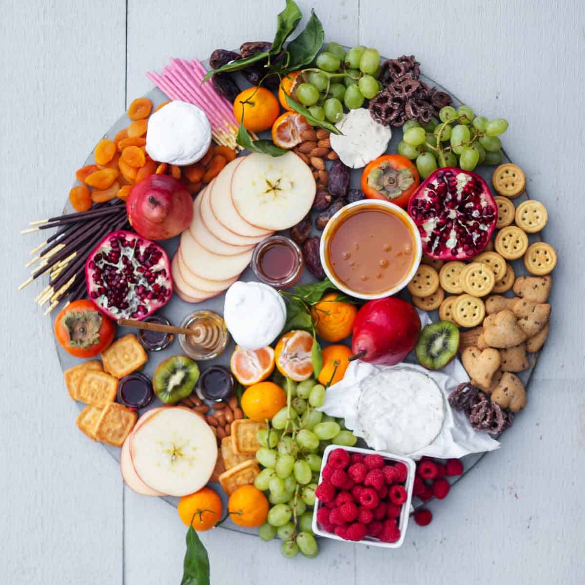 When you know How to Make a Dessert Charcuterie Board, it’s easy to create a fun and interactive spread for any event! charcuterie board | dessert cheese ideas | how to make where to buy a charcuterie board out of wood | cheese plate idea without meat | charcuterie tray for a crowd for party brunch 