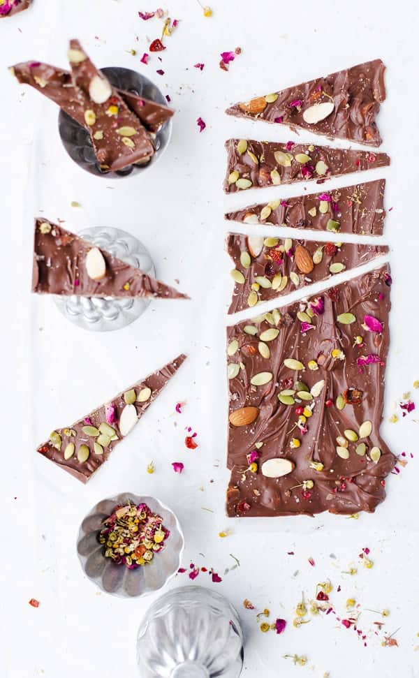 With common foods, edible flowers and adaptogens it's easy to whip up a delicious Aphrodisiac Chocolate Bark just in time for Valentine's Day!   aphrodisiac how do they work, meaning, food, herbs | adaptogens | edible flowers | valentines day gifts |  Chocolate bark | aphrodisiac desserts |  