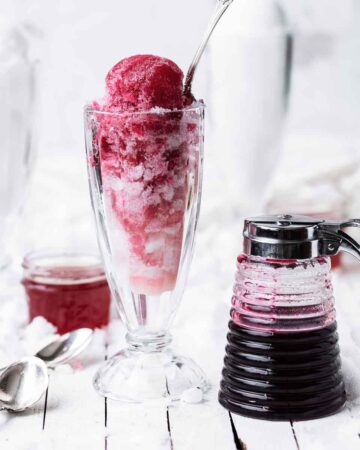 This Real Fruit Syrup Snow Cone Syrup recipe can be used to make a variety of homemade berry and fruit syrups. Use the homemade fruit syrup for snow cones, to sweeten cocktails or drizzle on pancakes, ice cream, cheesecake and more!