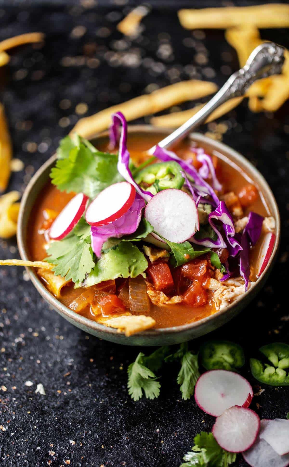 Chicken Tortilla Soup served with the soup base, chicken and toppings all separately to top as you'd like is perfect to serve a crowd!