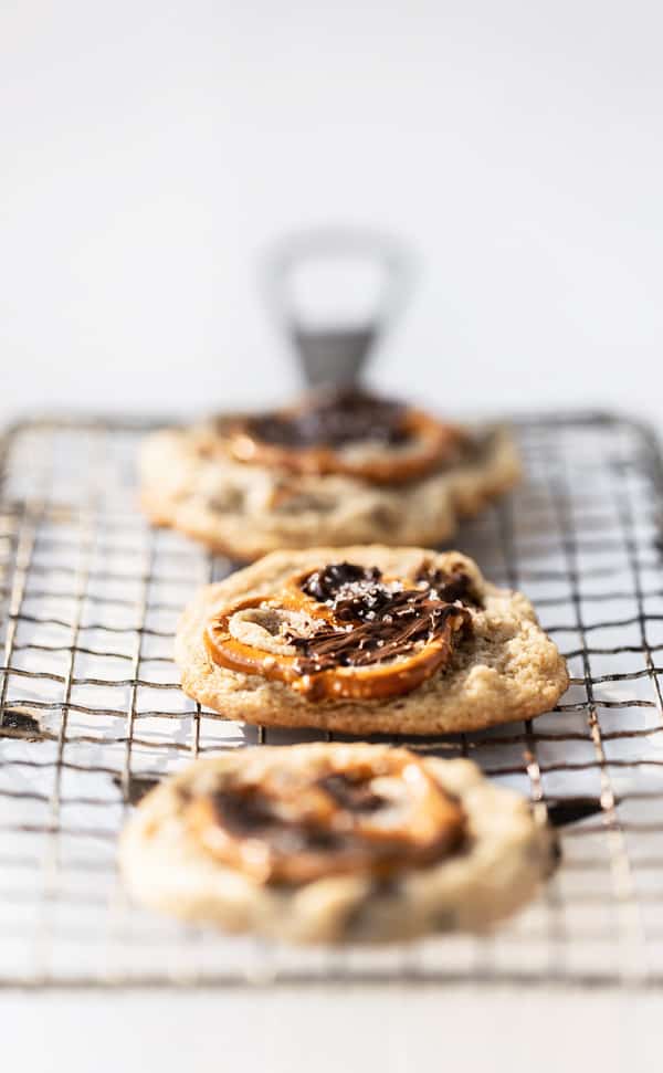 Pretzel Chip Cookies have pretzels in the batter three ways, brown sugar & a delicate dusting of flaky sea salt for a deep, toasty flavor, and an addicting chewy + crispy texture. pretzel cookies | chocolate chip pretzel cookies | chocolate chip cookies recipe | recipes with pretzels