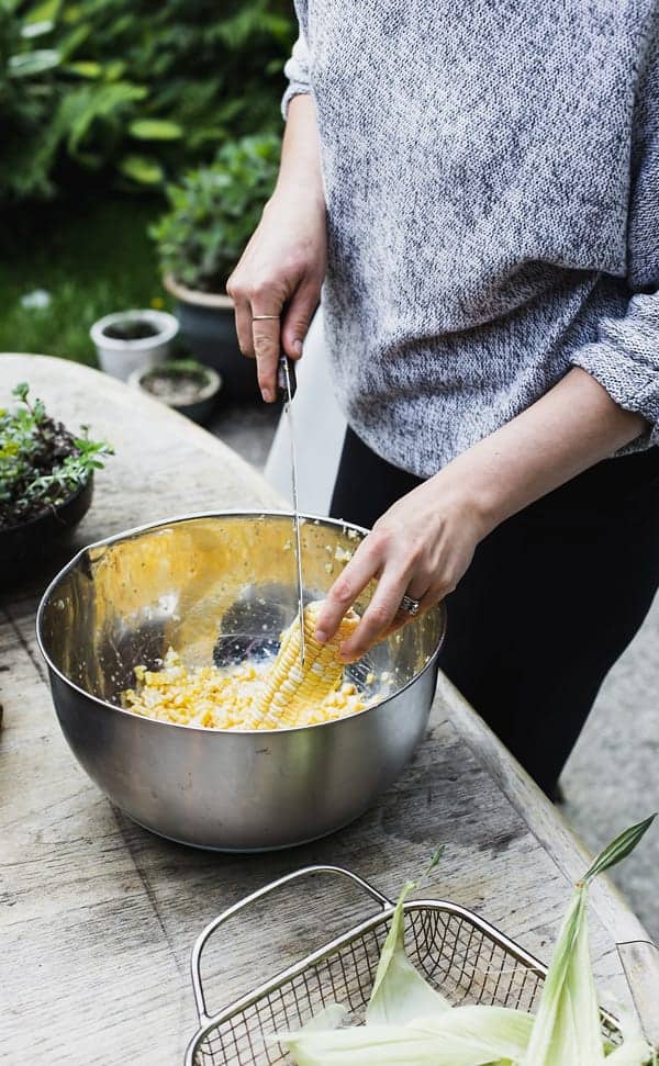 Warm up with a hearty bowl of this Bacon Corn Chowder using fresh corn on the cob when it's available or frozen corn to get this delicious meal on the table FAST year round! corn chowder recipe | best corn chowder soup with potato and bacon