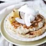 Bruleed Pineapple Coconut Pancakes are fresh and fruity with a little bit of toasted coconut goodness and a crispy caramelized sugar topping. A great twist on everyone's favorite classic breakfast! pina colada | pancakes recipe from scratch | pineapple coconut flavored pancakes