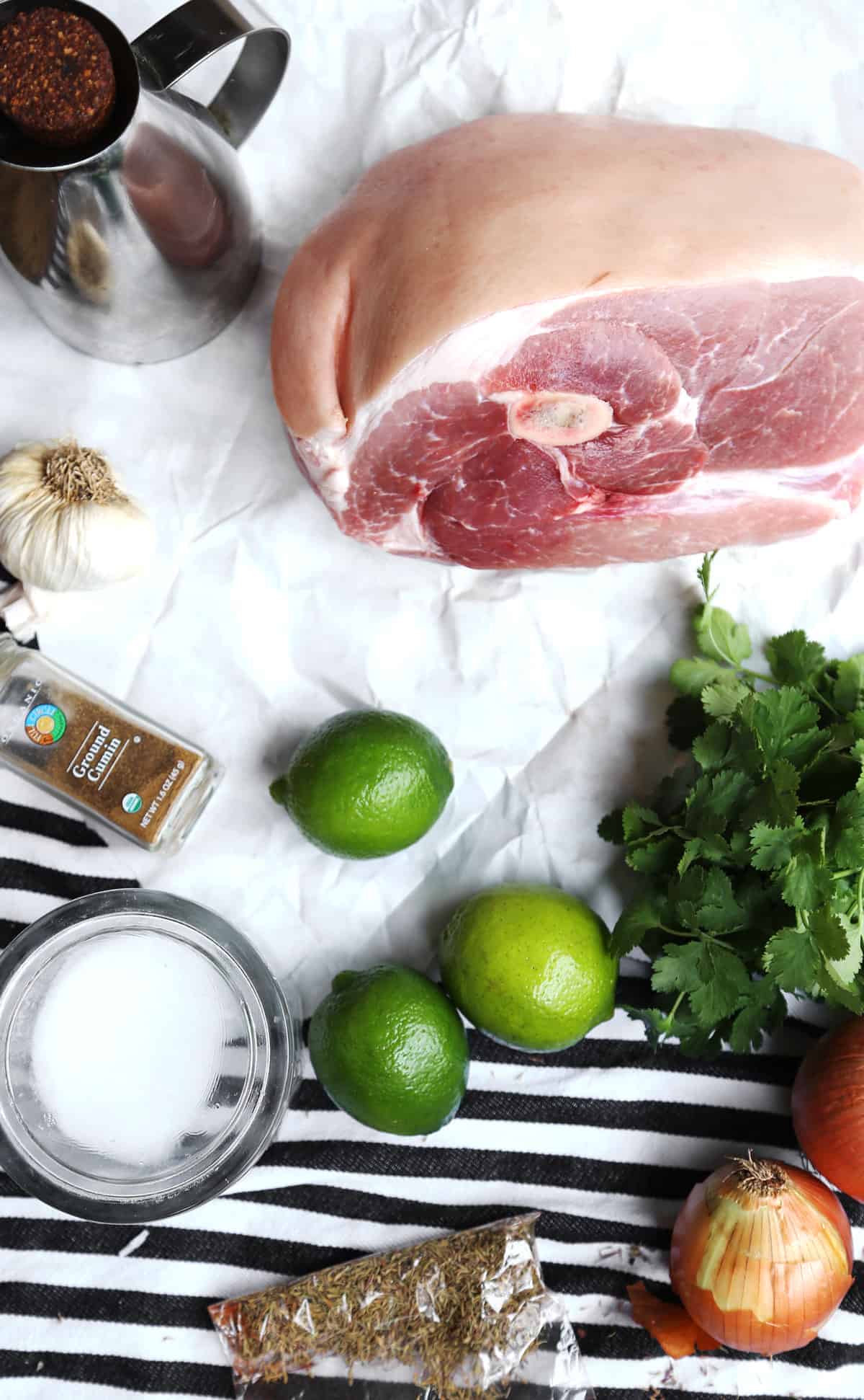 A platter of pork roast shredded into a succulent filling for tacos. A delicious pork taco recipe!