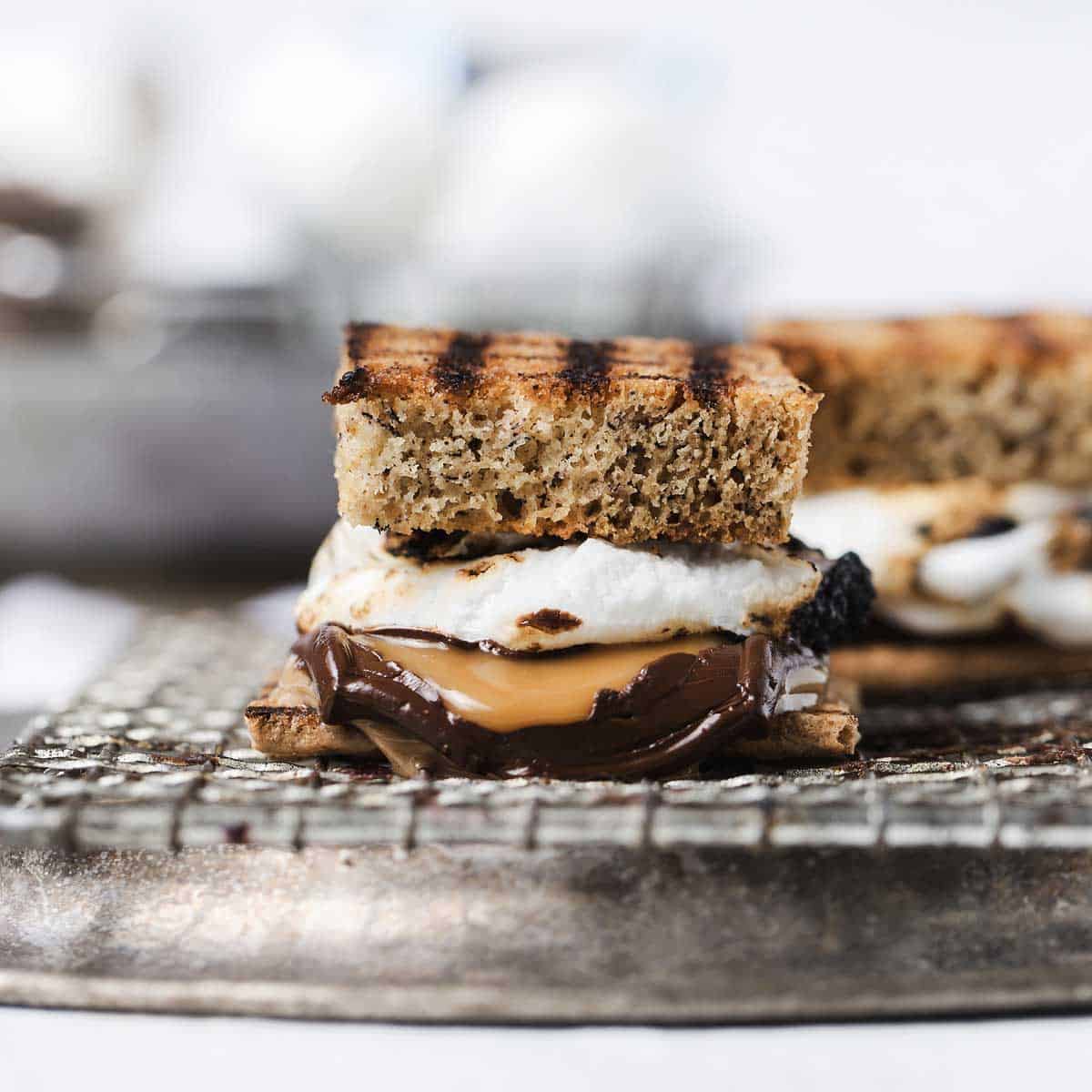 Elvis S'mores are a delicious gourmet s'mores recipe mashup of The King's favorite sandwich and the king of campfire desserts! S'mores recipe | how to make smores at home | Smores dessert | s'mores kit