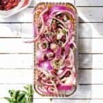 Sumac Herb Marinated Red Onions get a hefty dose of fresh herbs and sumac for bright citrus flavor with an herby bite. Keep a batch of this delicious homemade condiment in your fridge to add flavor and zest to meals all week long! marinated onions | pickled onions | sumac