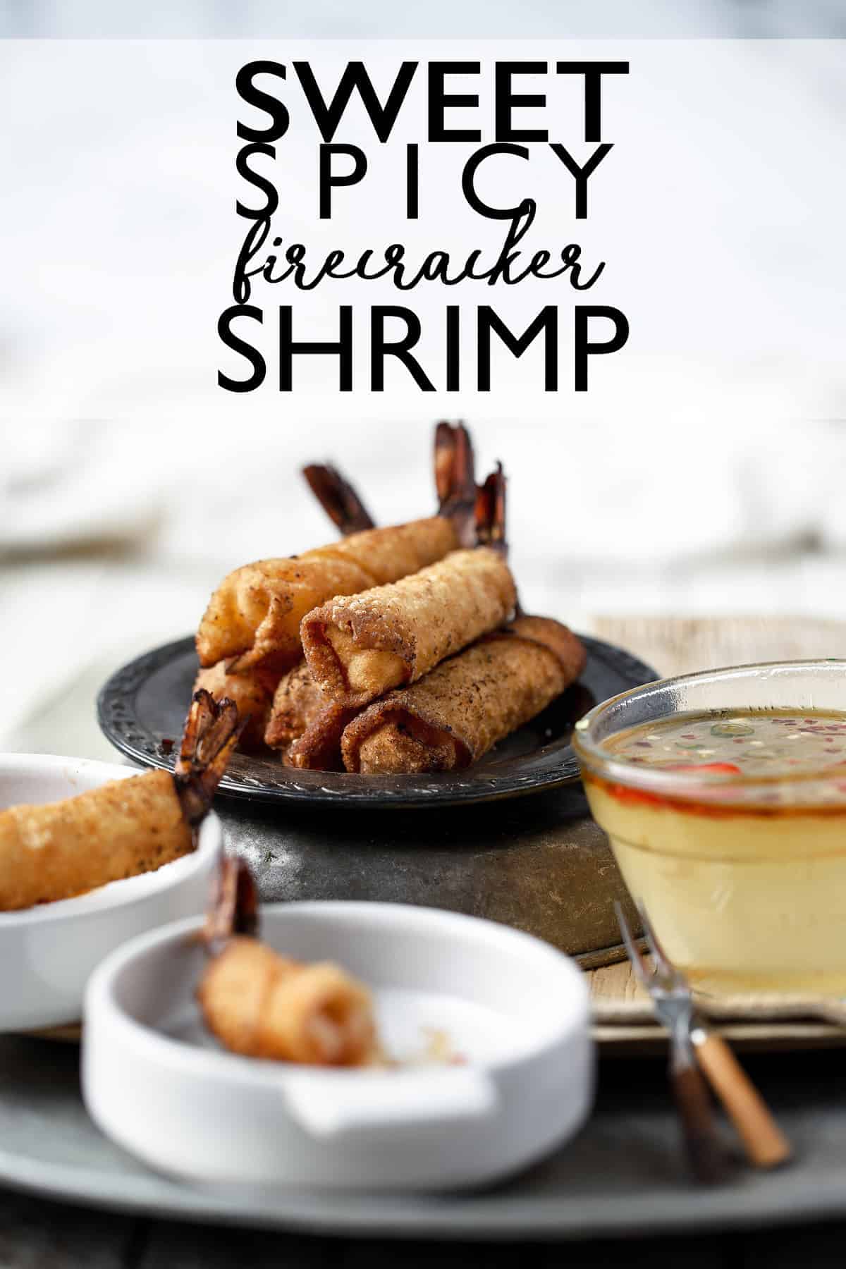 Firecracker Shrimp Rolls are a handheld appetizer with a sweet and spicy flavor and addicting crunch that keeps you coming back for more! Sweet Spicy Firecracker Shrimp | Sweet Shrimp | Spicy Shrimp | Shrimp egg rolls | shrimp lumpia | shrimp recipe | make ahead appetizer