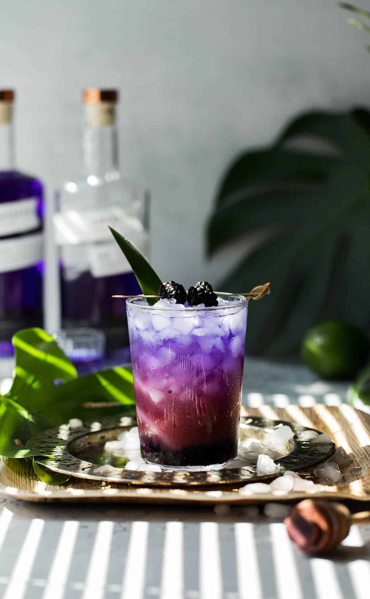 a layered purple and pink gin cocktail