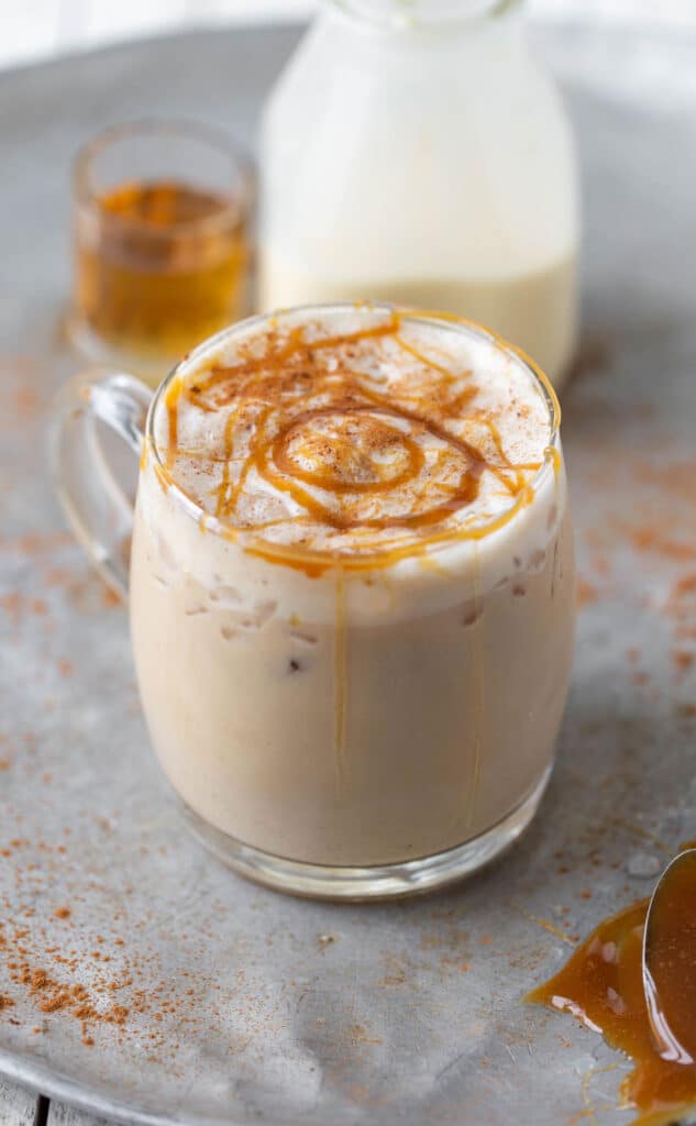 Salted Caramel Eggnog Cocktail mixed with salted caramel whiskey, store-bought eggnog and a splash of soda. salted caramel whiskey eggnog cocktail recipe | eggnog mixed drinks recipes