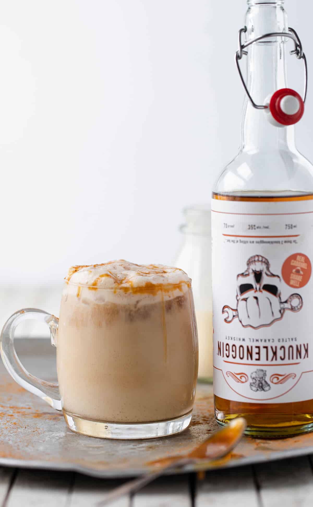 Salted Caramel Eggnog Cocktail mixed with salted caramel whiskey, store-bought eggnog and a splash of soda. salted caramel whiskey eggnog cocktail recipe | eggnog mixed drinks recipes