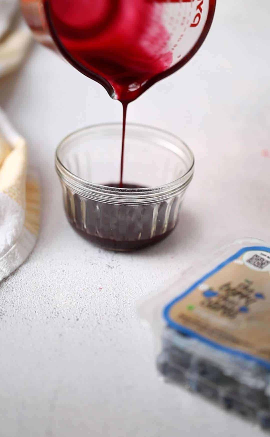 pour berry sauce into serving dish