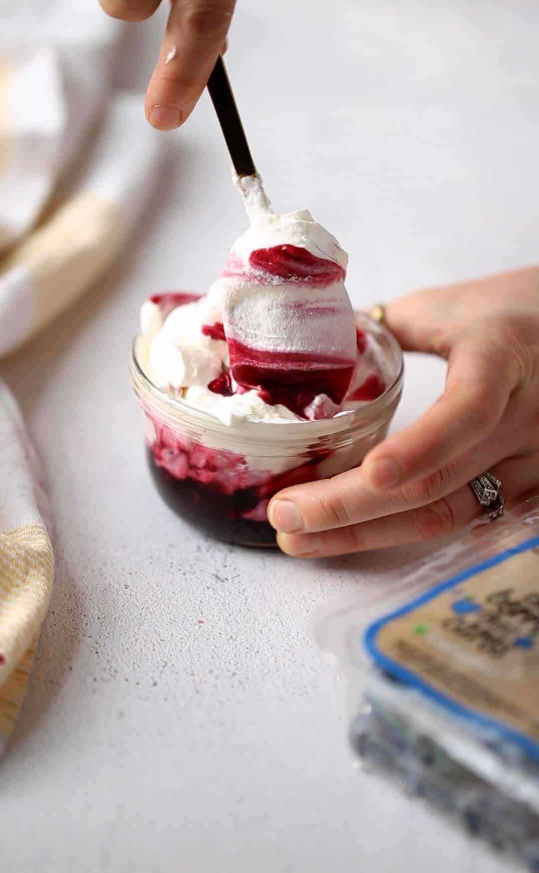 Berry Whipped Cream is a delicious fluffy homemade sweet treat that can be used as a dip, filling, frosting and more. blueberry whipped cream | berry cream | berries and cream