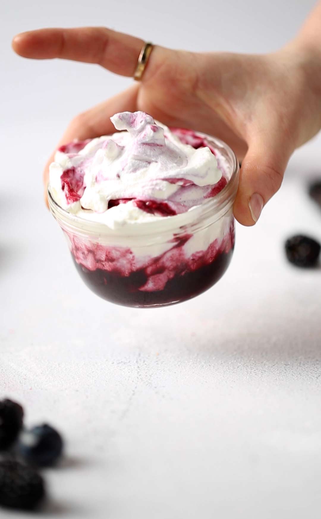 Berry Whipped Cream is a delicious fluffy homemade sweet treat that can be used as a dip, filling, frosting and more. blueberry whipped cream | berry cream | berries and cream