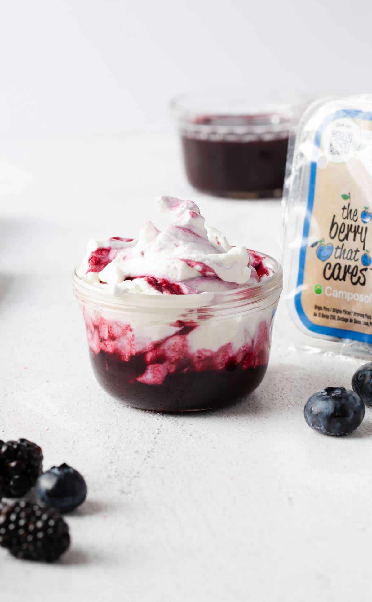 Berry Whipped Cream is a delicious fluffy homemade sweet treat that can be used as a dip, filling, frosting and more. blueberry whipped cream | berry cream | berries and cream