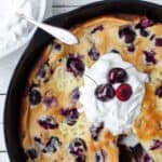 Cherry Clafoutis is a quick and easy (but super impressive!) dessert with a velvety custard-like texture studded with delicious pockets of fresh juicy berries. clafoutis recipe | cherry clafoutis | clafoutis aux cerises