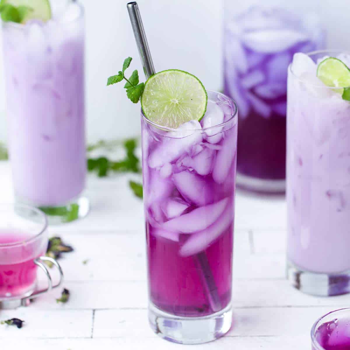 Color Changing Butterfly Pea Flower Mocktail is a color changing butterfly pea drink with mojito inspired flavors. color changing drink | butterfly pea drink | mojito mocktail | color changing lemonade recipe