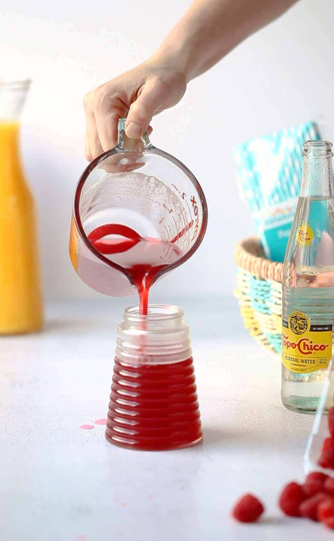 Raspberry Syrup is a delicious simple syrup recipe that once you learn how to make you will realize how versatile it is. raspberry syrup | raspberry simple syrup | simple syrup recipe