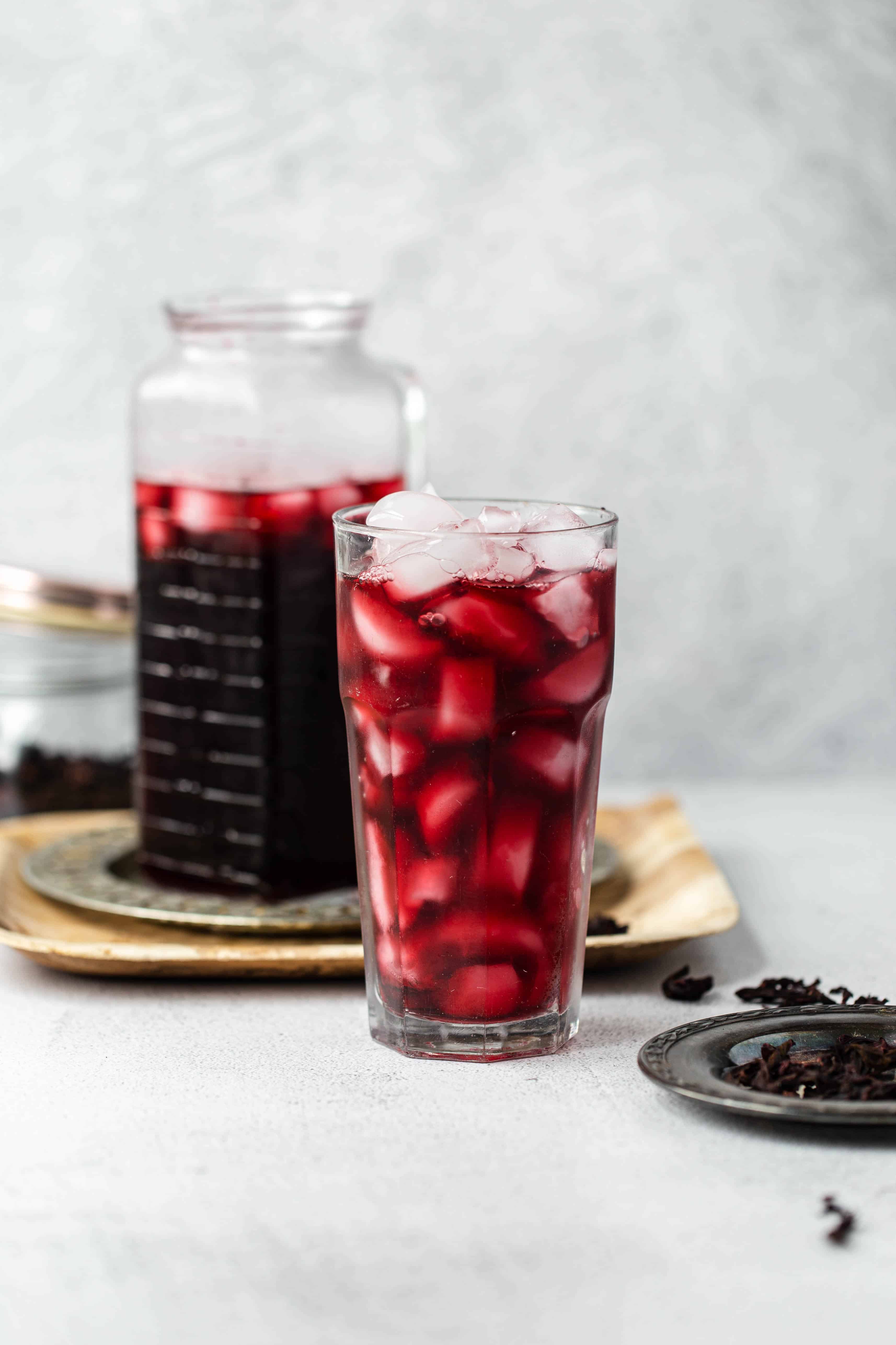 Sweet Hibiscus Tea is a delicious, tart and refreshing easy to make tea that is delicious served as an herbal iced sweet tea. agua de Jamaica | hibiscus tea | hibiscus tea benefits | hibiscus tea recipe