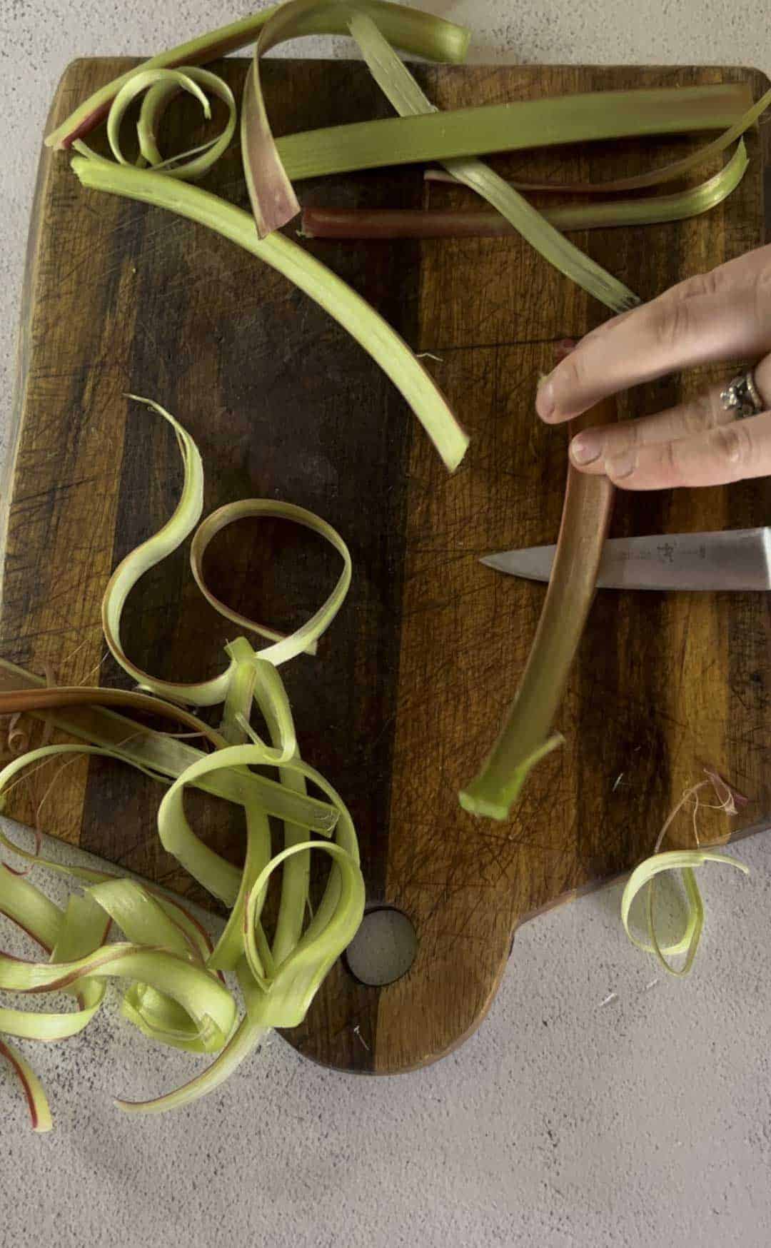 Candied Rhubarb Ribbons are the perfect chewy, sweet rhubarb recipe to enjoy as a snack or as a garnish for desserts and cocktails. candied rhubarb  | sugared rhubarb  | rhubarb recipe | dried rhubarb