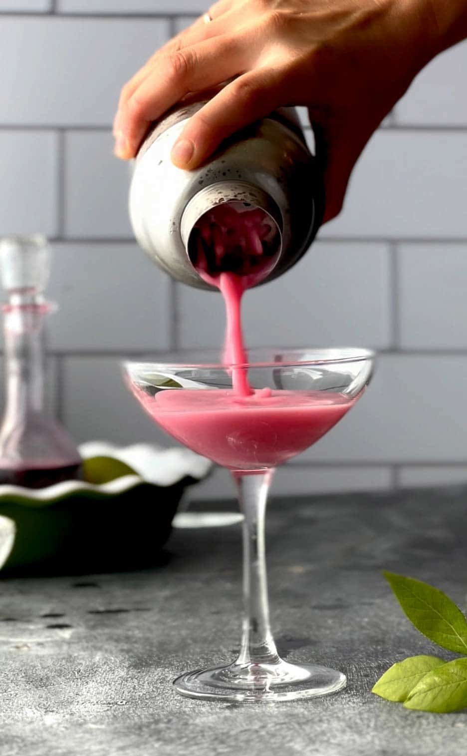 Blueberry Pie Martini is a decadent fresh blueberry cocktail recipe that tastes like a slice of blueberry cream pie or blueberry pie ala mode in a glass. blueberry pie | blueberry vodka | blueberry drink | blueberry cocktail | blueberry martini | blueberry vodka cocktail | blueberry vodka martini | blueberry pie shot