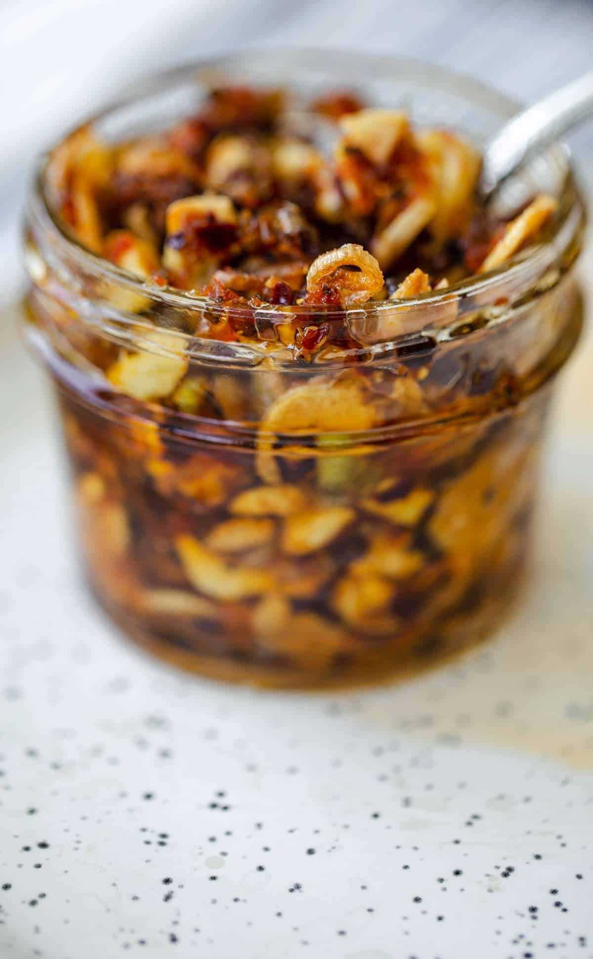 Homemade Spicy Chili Crisp is the best chili crisp recipe so you can make this flavorful, garlic crunch condiment at home. chili crisp | crispy chili oil | chili crispy recipe | chili crunch