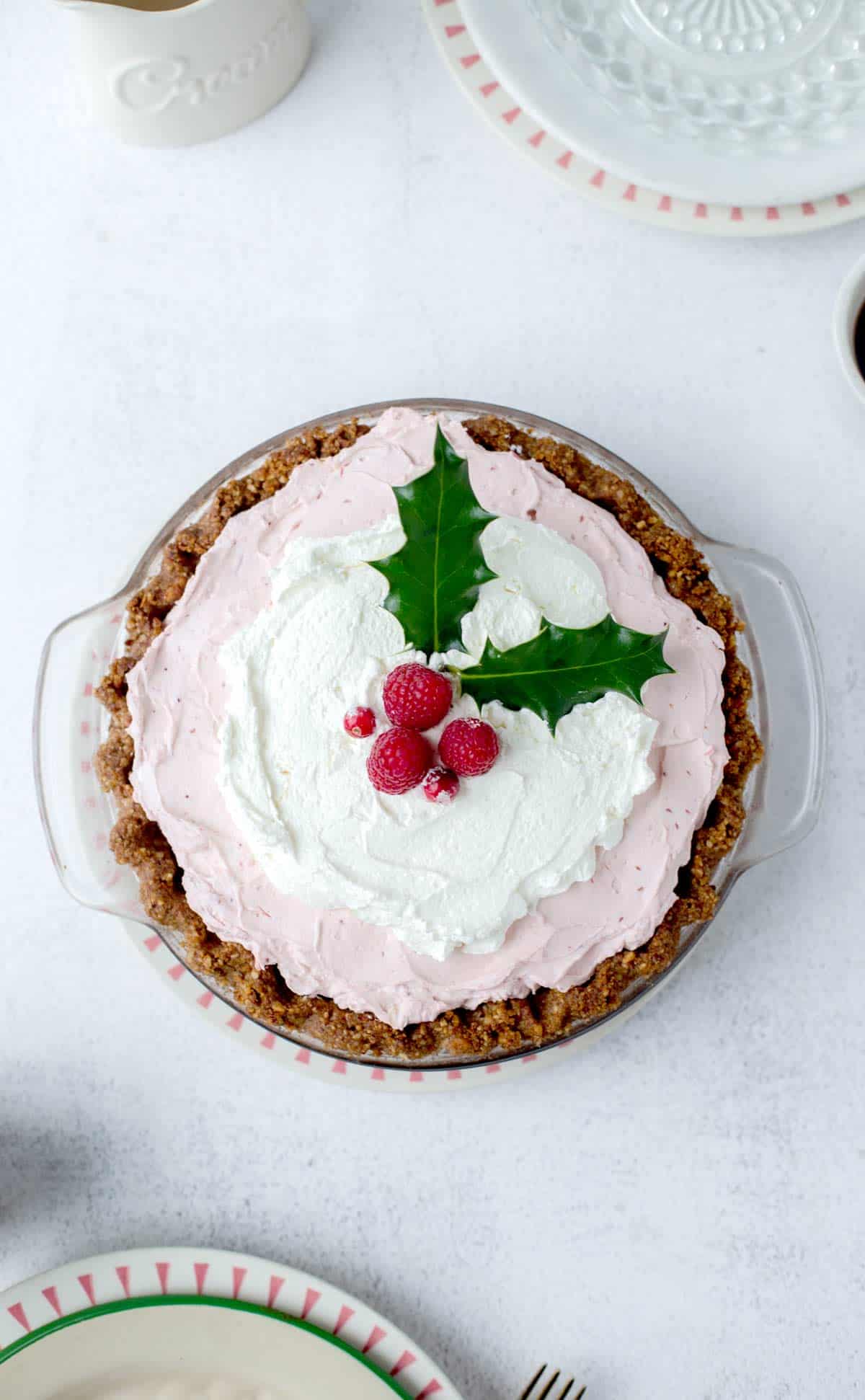 Creamy Cranberry Pie is a cranberry pie recipe with a mix of sweet tart berries and freshly whipped cream in a toasted gluten free pecan pie crust.  gluten free christmas desserts | cranberry pie | cranberry pie recipe | cranberry cream pie recipe