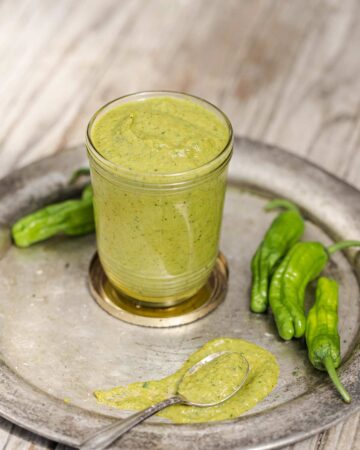 Blistered Shishito Pepper Sauce is a tangy all purpose green sauce recipe that adds bright shishito pepper flavor to all sorts of dishes. shishito peppers | shishito peppers recipe | shishito pepper sauce