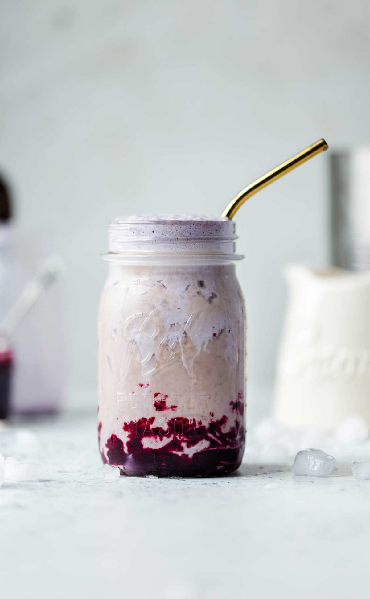 Iced Cinnamon Brown Sugar Blueberry Coffee is a fruity iced coffee recipe sweetened with blueberry brown sugar puree and topped with a layer of luscious blueberry cold foam soft top.