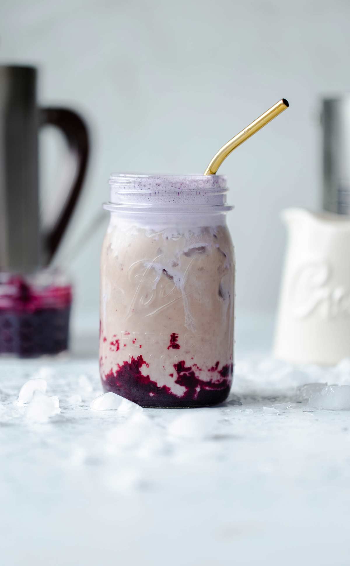 Iced Cinnamon Brown Sugar Blueberry Coffee is a fruity iced coffee recipe sweetened with blueberry brown sugar puree and topped with a layer of luscious blueberry cold foam soft top.