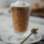 Creamy Chai Spiced Hot Buttered Rum is a warm cocktail for winter that uses all the traditional hot buttered rum ingredients plus a little extra spice for a delicious hot buttered rum variation. hot buttered rum cocktail | hot buttered rum variations | hot buttered rum recipe | how to make hot buttered rum | chai hot toddy