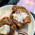 Marigold Muffins are a sweet comforting muffin recipe made with fresh marigold petals and a generous amount of honey in the batter. Marigold recipe | edible marigolds | edible flower recipe | flower muffins