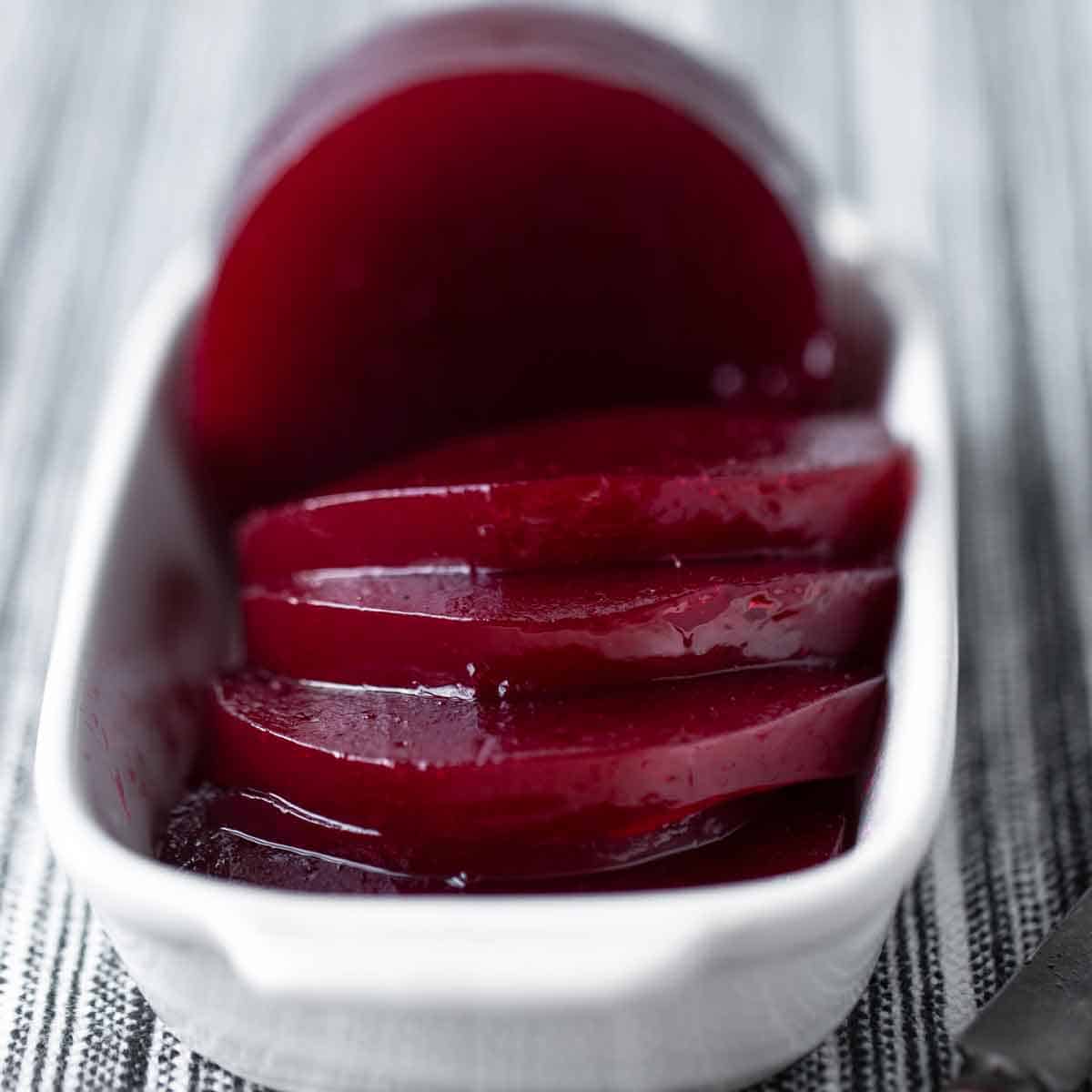 Jellied Cranberry Sauce is a homemade cranberry sauce recipe that is just like the old fashioned canned cranberry sauce only made from scratch with fresh cranberries, raspberries and oranges. cranberry sauce recipe | canned cranberry sauce | homemade cranberry sauce | canning cranberry jelly