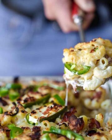 Jalapeno Bacon Mac and Cheese is a bacon mac and cheese recipe inspired by bacon jalapeno poppers with creamy, bubbly baked jalapeno, bacon, gouda, cheddar cheese sauce coated macaroni. jalapeno bacon mac and cheese | mac and cheese recipe | jalapeno popper mac and cheese