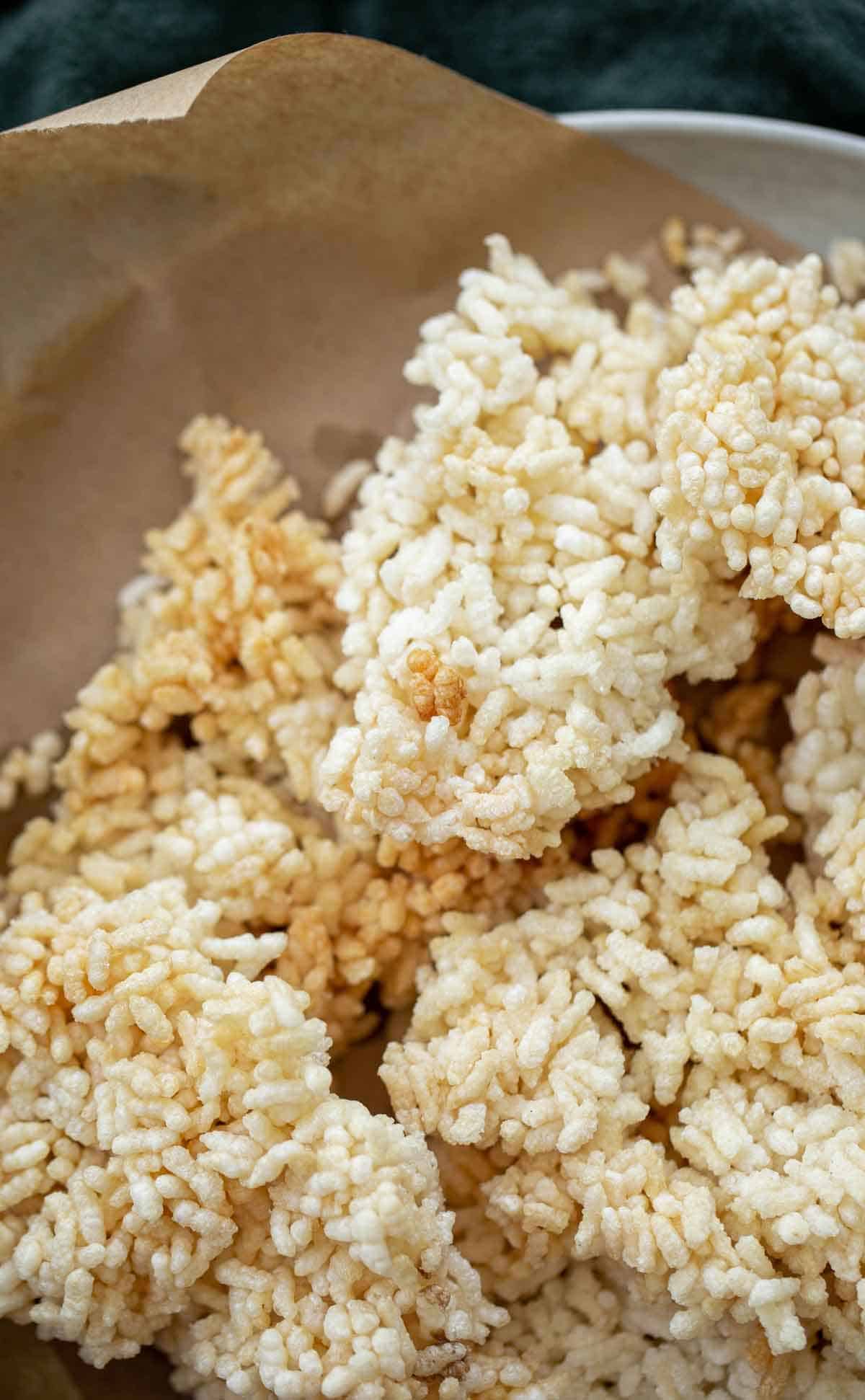 Puffed squares of rice for sizzling rice soup.