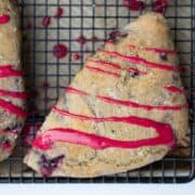 Blackberry scones with bright pink blackberry glaze.