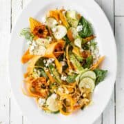 Squash salad recipe with carrot ribbons, lemon and herbs