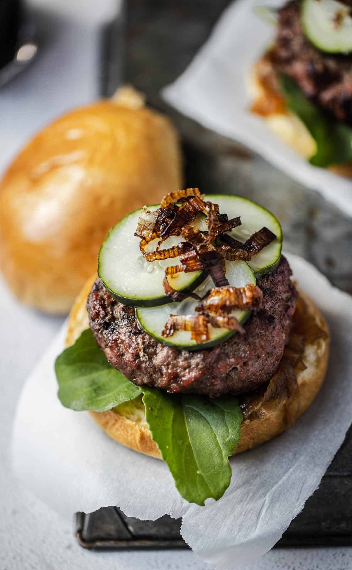 Burger toppings on a gouda burger